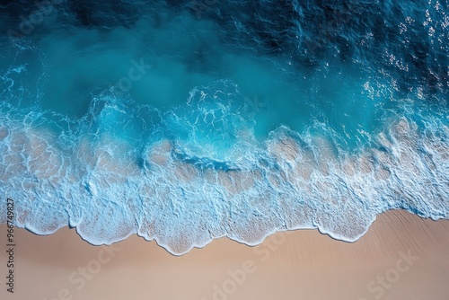 Aerial View of Turquoise Ocean Waves Crashing on Sandy Beach