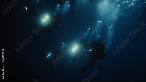 Wallpaper Mural Divers with Lights Descending into Deep Ocean
 Torontodigital.ca