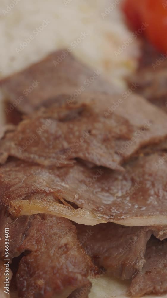 Doner kebab with served with salad and rice Doner kebab with served with salad and rice