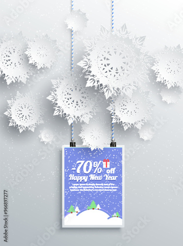 A festive New Year sale advertisement with 70 percent discount offer. White snowflakes hang against a snowy background with a blue, snowy landscape card. Ideal for holiday promotions, winter sales