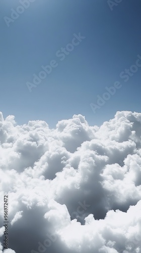 Expansive clouds stretch across the outdoor sky.