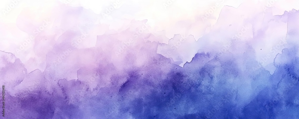 Fototapeta premium A serene watercolor gradient featuring soft hues of purple and blue, perfect for backgrounds, designs, and artistic projects.