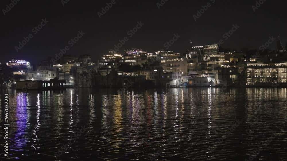 Night View of Lake City with Dramatic Lighting from Unique Perspective video is taken at Udaipur rajasthan india. Night View of Lake City with Dramatic Lighting from Unique Perspective video is taken at Udaipur rajasthan india.