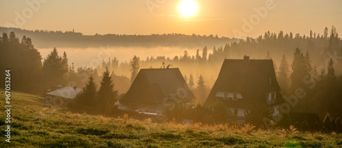 Fototapeta Naklejka Na Ścianę i Meble -  Beautiful, misty sunrise over a mountain village in the Carpathian Mountains.Poland
