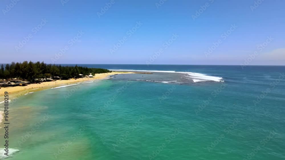 a Coastal Beach with a Towering Hill Behind a Coastal Beach with a Towering Hill Behind