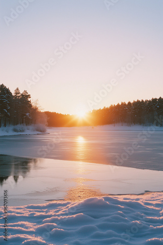 Winter sunset over a frozen lake  warm hues in the sky  peaceful and serene setting