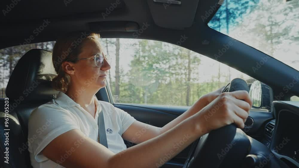 Driving through a serene forest during golden hour in an elegant sedan Driving through a serene forest during golden hour in an elegant sedan