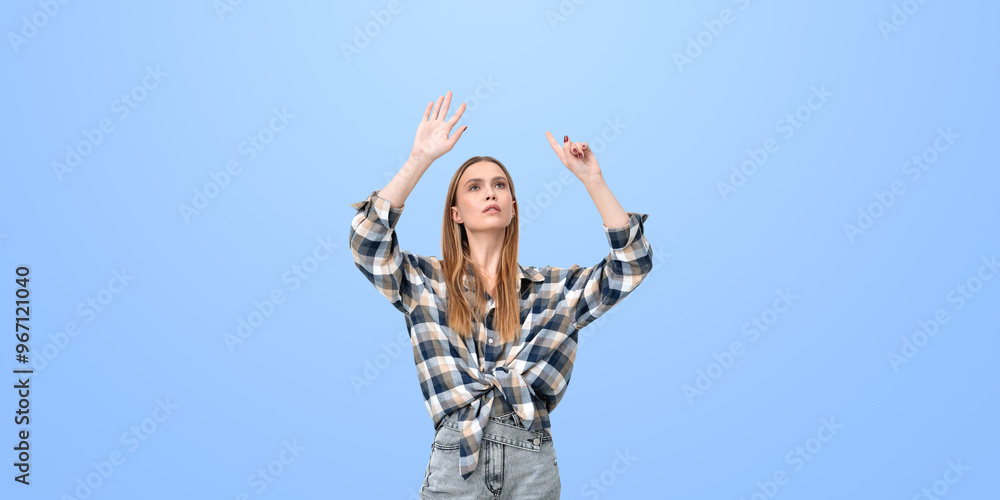 Serious woman finger touch something on copy space background Serious woman finger touch something on copy space background