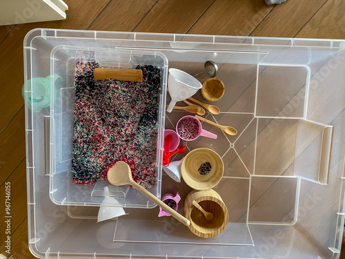 A bin of play rice