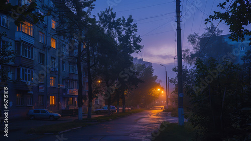 In the early morning gloom, a three-story school and surrounding Khrushchev-era buildings are lit by cold blue lights and eerie orange lampposts, creating an oppressive atmosphere. photo