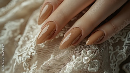 Brown queen nails resting on a lace glove, classic bridal elegance with soft lighting and luxurious manicure focus photo