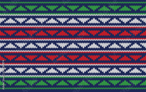 Knitted pattern seamless ethnic fabric Christmas color theme on green. traditional knitted pattern triangle pattern. Designed for knitted pattern ,background ,wallpaper ,embroidery ,textile ,fabric