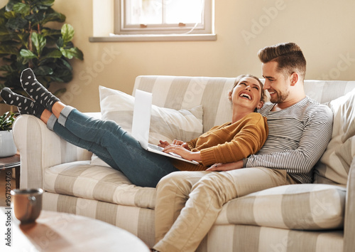 Billede på lærred Happy couple, love or laptop in home for choice, news and loan option online on couch in living room