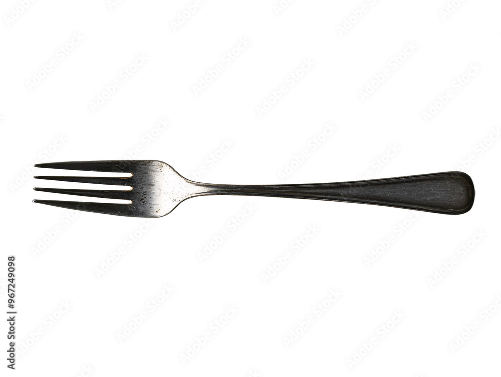 a fork on a white surface