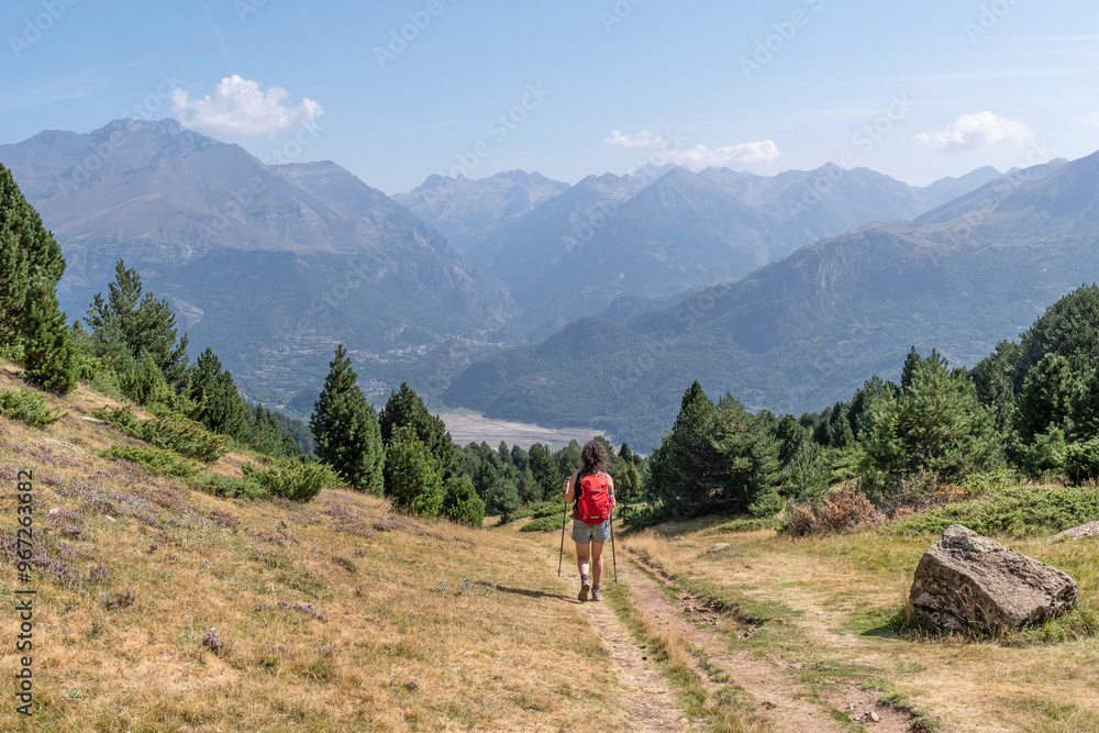 Fototapeta premium Hiker in the Tena Valley. Huesca, Aragon Pyrenees