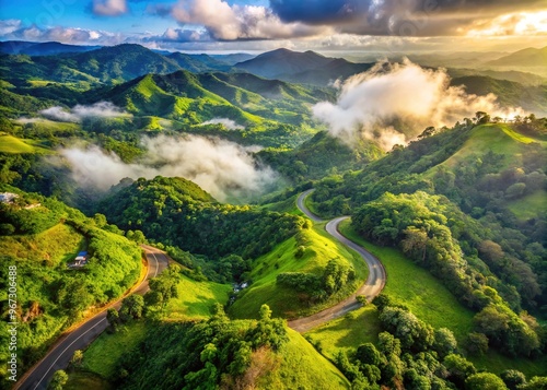 Rural landscape of lush green hills and valleys in Orocovis, Puerto Rico, with winding roads and misty fog rolling in, showcasing the region's natural beauty. photo