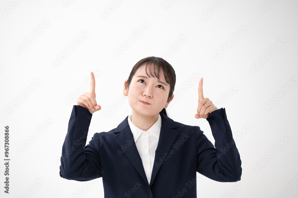 スーツを着た女性 指差し オススメ スーツを着た女性 指差し オススメ