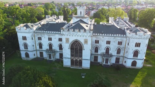 Stunning 4K drone footage of Zichyho Mansion in Rusovce, Slovakia. Enjoy breathtaking aerial views of this historic manor surrounded by beautiful gardens and lush greenery photo