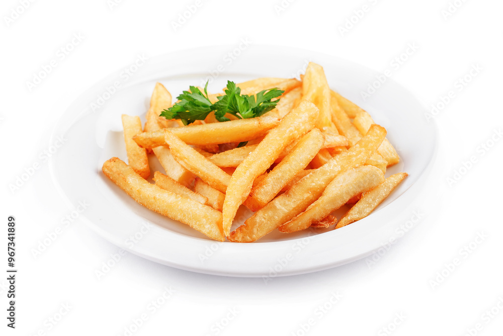 White plate is holding french fries and a parsley garnish White plate is holding french fries and a parsley garnish