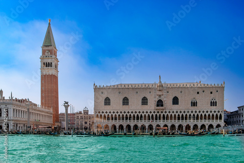 Obraz na płótnie Beautiful view of Venice, Italy with Campanile tower of Saint Mark's Cathedral, Basilica on San Marco square and Doges' Palace. Italian buildings cityscape. Famous romantic city on water. w salonie