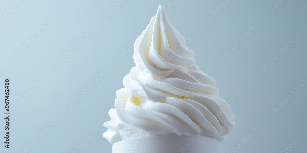 Delicious and creamy soft serve ice cream in a classic swirl, perfect for summer treats and desserts. Delicious and creamy soft serve ice cream in a classic swirl, perfect for summer treats and desserts.