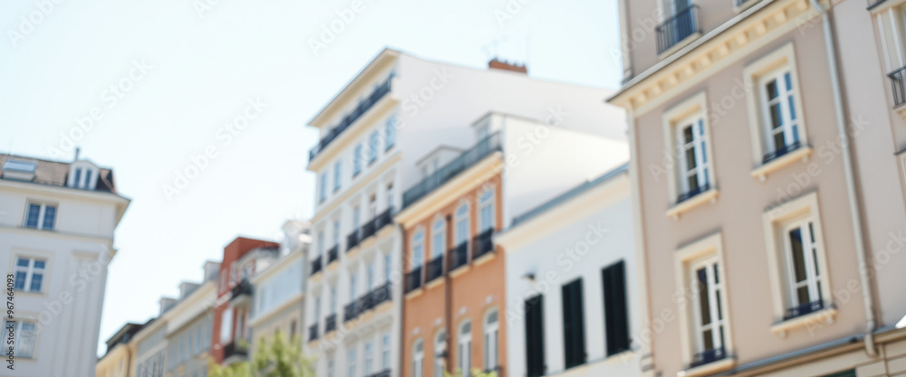 Naklejka premium Blurred Row of Old Buildings in a City