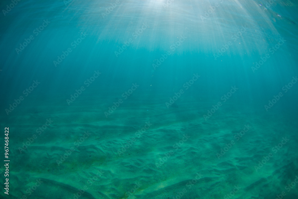 Beautiful sunbeam on the shallow beach underwater. Beautiful sunbeam on the shallow beach underwater.