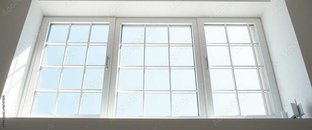 White window with bright blue sky White window with bright blue sky