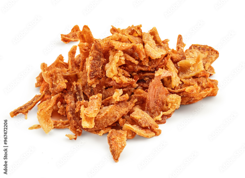 Pile of crispy fried onions isolated on white. Roasted caramelised Onions pieces, cooking ingredients. Pile of crispy fried onions isolated on white. Roasted caramelised Onions pieces, cooking ingredients.
