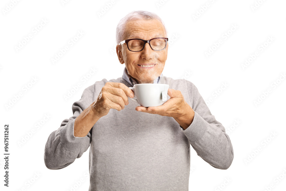 Elderly man enjoying the smell of a coffee Elderly man enjoying the smell of a coffee