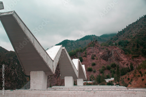 mountain staircase in Medeo mountains with autumn landscape on the background photo