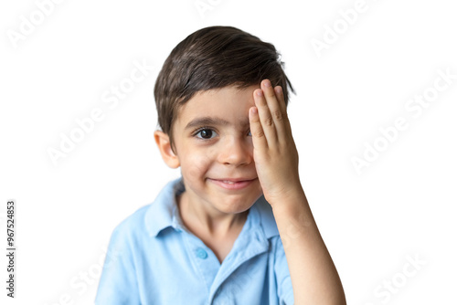 Kid close one eye with hand to check vision on white background. Vision testing concept. Lazy eye, amblyopia, strabismus