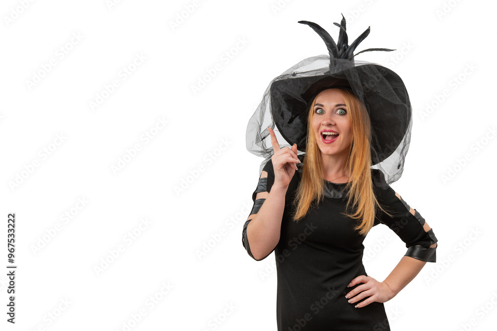 Surprised attractive woman in a black witch hat looks at the camera. Halloween costume, white background, space for text Surprised attractive woman in a black witch hat looks at the camera. Halloween costume, white background, space for text