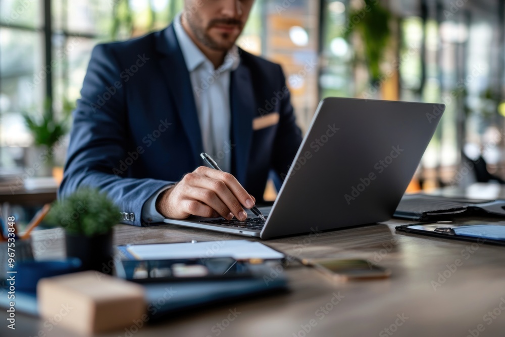 Close-up of a Businessman Working on a Laptop Close-up of a Businessman Working on a Laptop