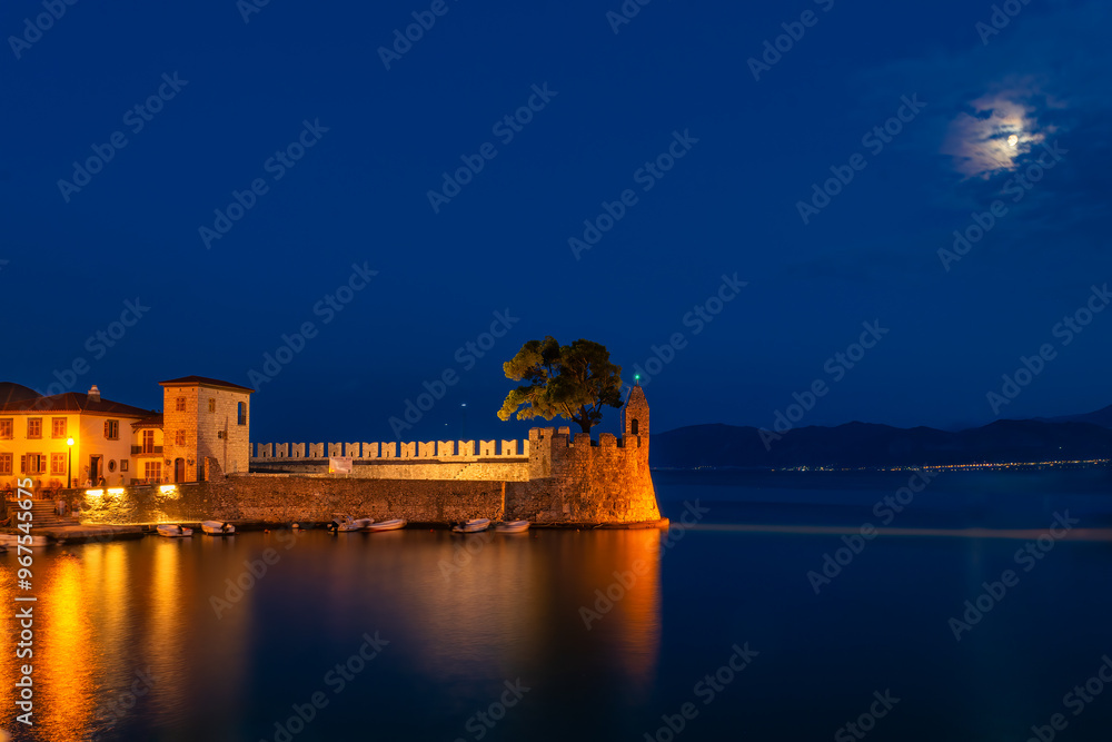 Beautiful port of Nafpaktos in Greece during blue hour.