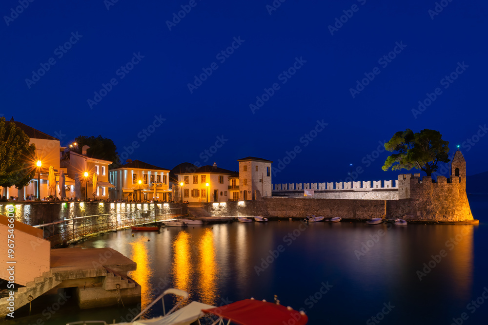 Nafpaktos port in Greece during blue hour. A beautiful touristic destination.