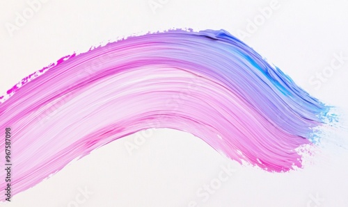 A brush stroke of paint with a pink, purple and blue hue