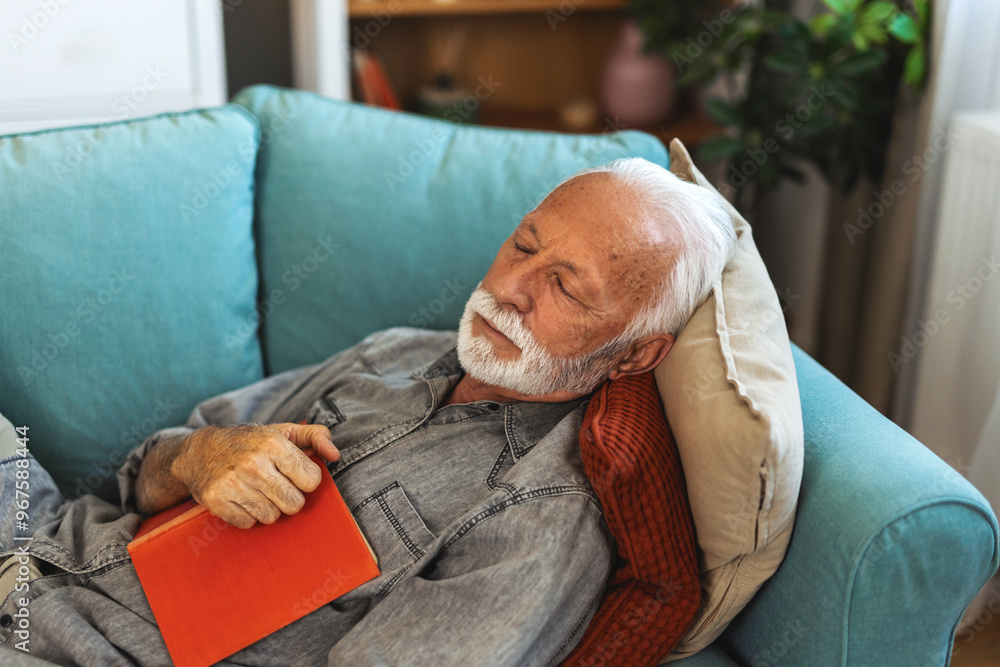 Relax, book and senior man sleeping in the living room of his modern ...