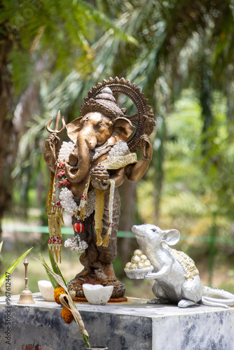 A statue of an indian god at the entrance of an Elephant sanctuary in Thailand