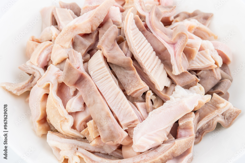 A dish of blanched pork belly slices A dish of blanched pork belly slices