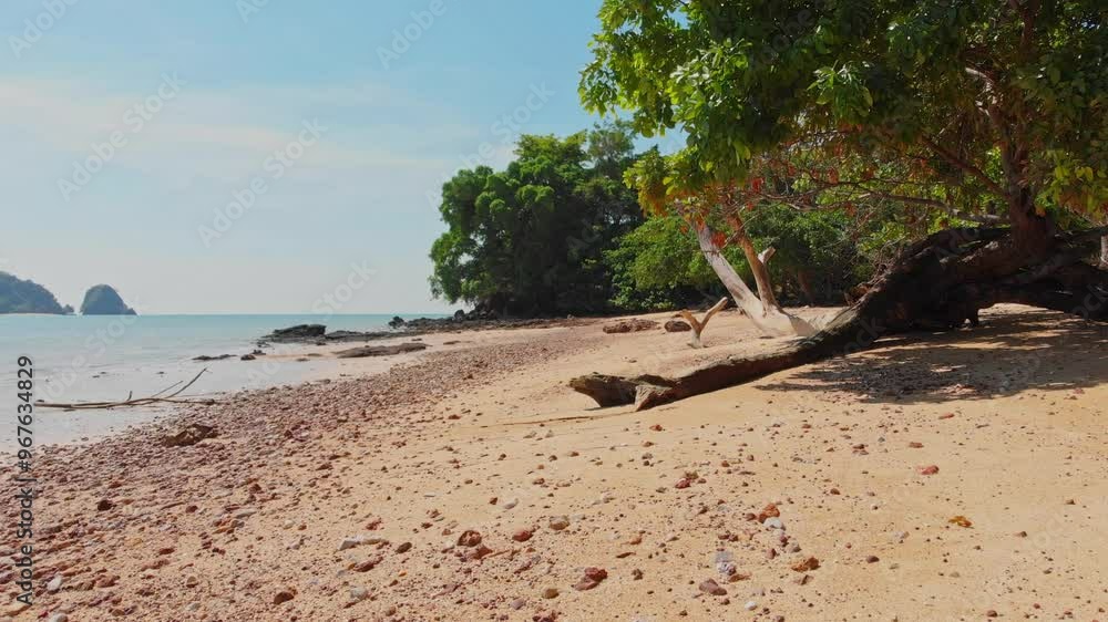 Aerial view of empty tropical beach with blue sea and sand, Ko Yao Noi, Thailand. Aerial view of empty tropical beach with blue sea and sand, Ko Yao Noi, Thailand.
