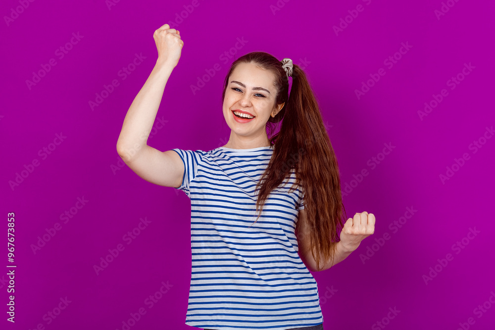 Joyful Young Woman Dancing with Delight After Receiving Good News on Smartphone. Happiness, Excitement and Celebratory Reactions to Positive Messages and Surprise Joyful Young Woman Dancing with Delight After Receiving Good News on Smartphone. Happiness, Excitement and Celebratory Reactions to Positive Messages and Surprise