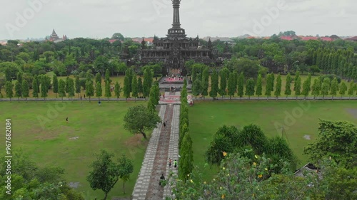 Aerial view of the historical bajra sandhi monument surrounded by greenery and pathways in Denpasar, Bali, Indonesia. photo