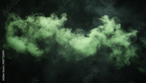 Green Smoke Cloud in Dark Background Creating a Spooky, Mysterious Atmosphere