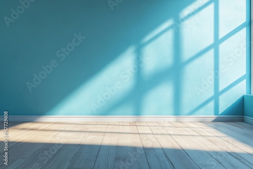 Empty room with blue wall and wooden floor. 