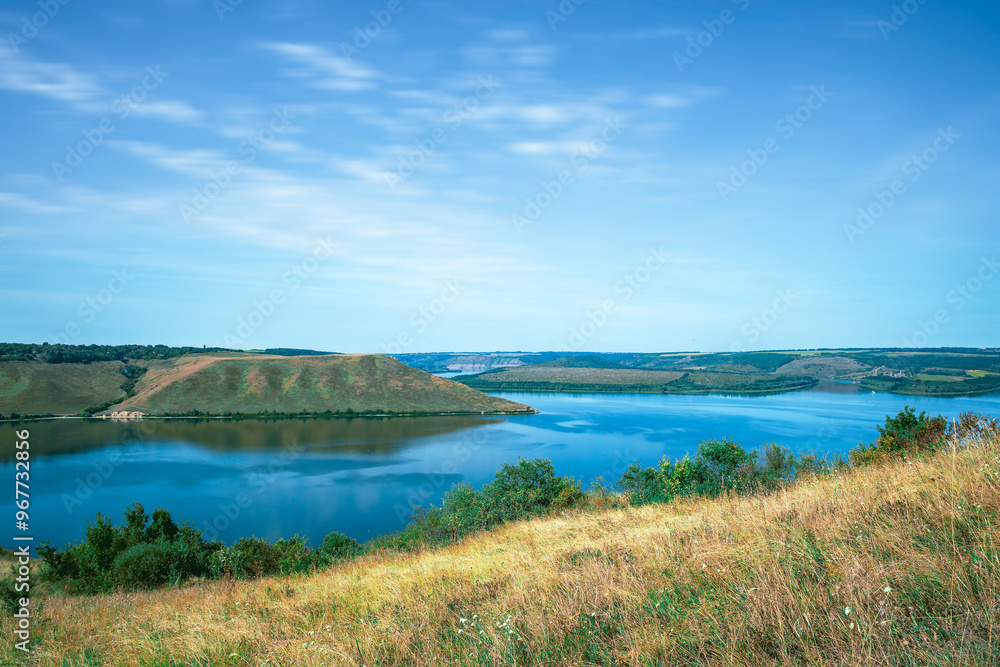 idyllic summer landscape travel destination photography picturesque country side hills coast line of blue water river bay in clear weather June day time idyllic summer landscape travel destination photography picturesque country side hills coast line of blue water river bay in clear weather June day time