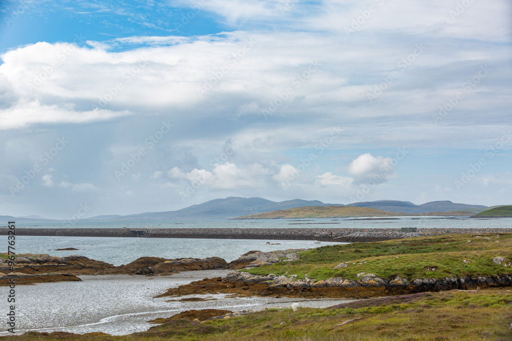 Landscape view of south Uist, Image shows a beautiful scenic photo of the remote Scottish island coastline during the summer Landscape view of south Uist, Image shows a beautiful scenic photo of the remote Scottish island coastline during the summer