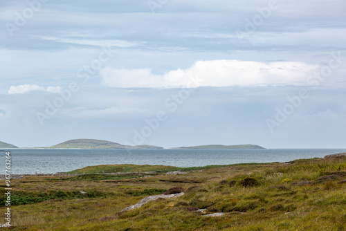 Landscape view of south Uist, Image shows a beautiful scenic photo of the remote Scottish island coastline during the summer 