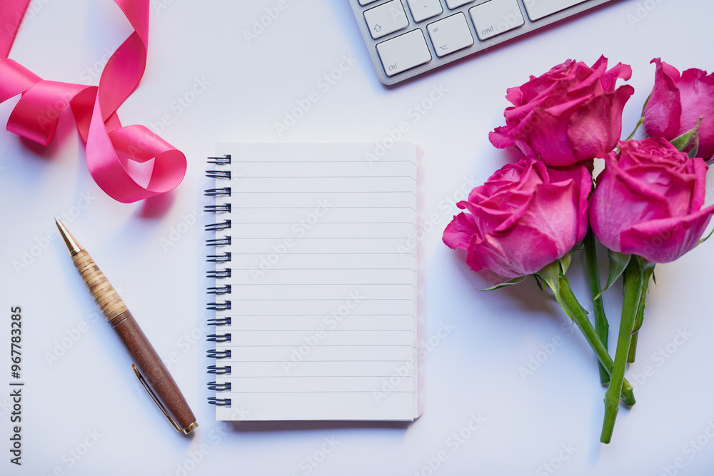Top view, notebook and stationery for writing on desk, flowers and sustainable paper for gratitude journal. Notepad, blank memo and rose for inspiration ideas, home office and diary for creativity Top view, notebook and stationery for writing on desk, flowers and sustainable paper for gratitude journal. Notepad, blank memo and rose for inspiration ideas, home office and diary for creativity