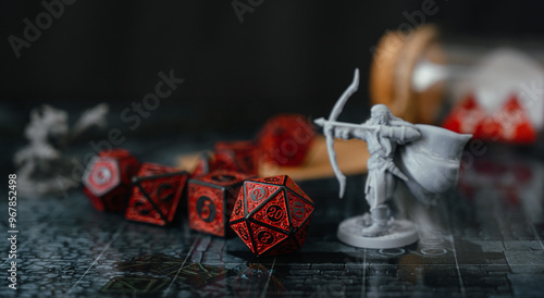 Miniatures and red dice place on playing map. roleplaying board game and hobby board games. for fantasy games. dice games and roleplaying board games